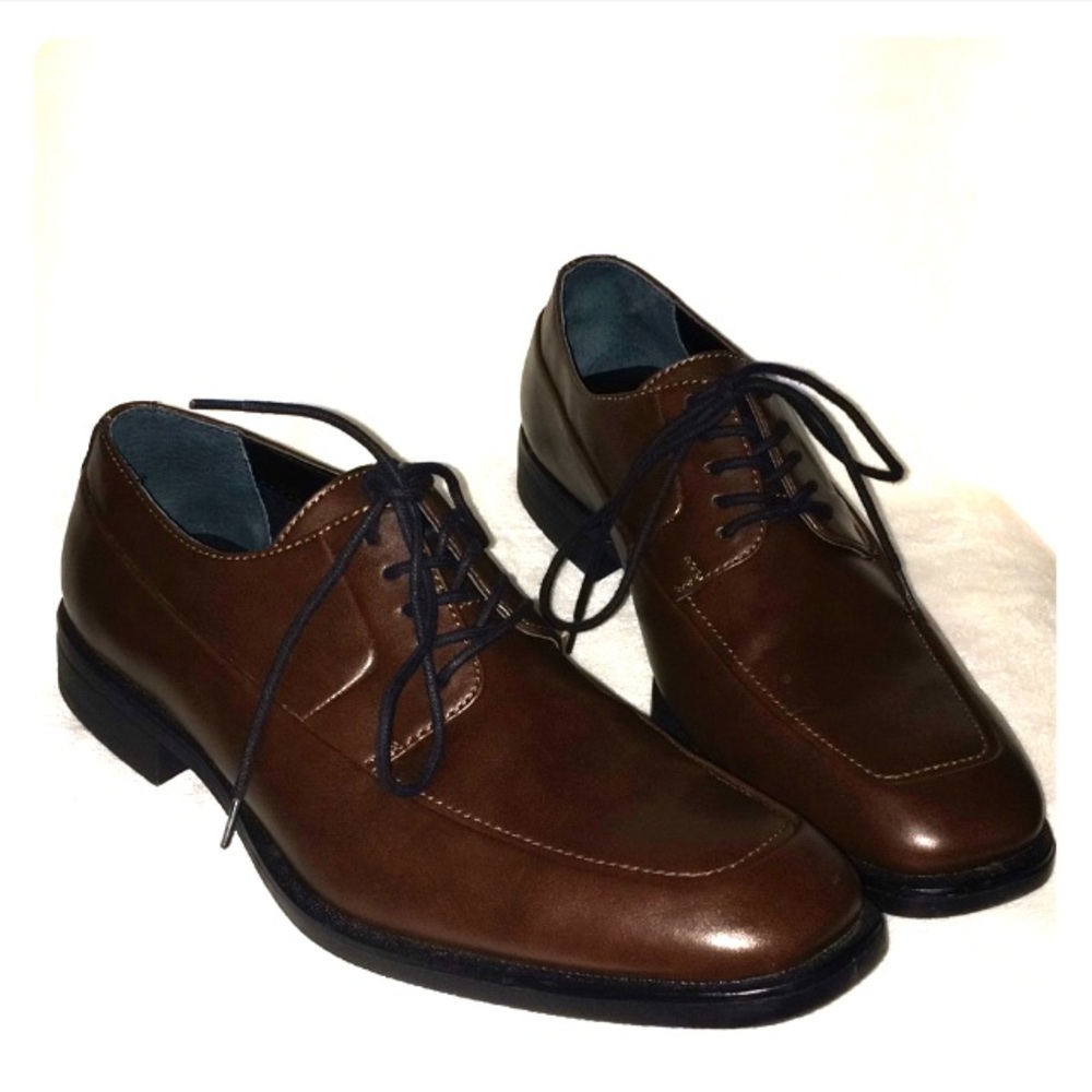 Calvin Klein Elroy brown lace up loafers.